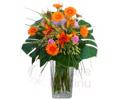 Mixed bouquet roses, lilies, gerberas, garlic and greenery