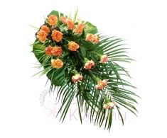 funeral spray - orange carnations, greenery