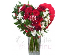 Mixed bouquet of flowers into heart shape